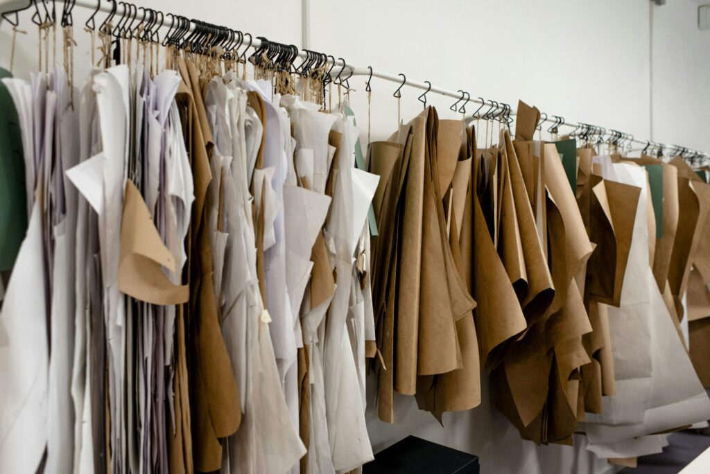 Organized sewing patterns in a fashion designer's studio, ideal for tailoring or design concepts.